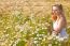 Blond Girl On The Camomile Field