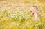 Blond Girl On The Camomile Field