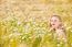 Blond Girl On The Camomile Field