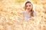 Portrait Of Beautiful Girl In Field