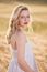 Portrait Of Beautiful Girl In Field