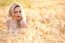 Portrait Of Beautiful Girl In Field