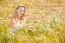 Blond Girl On The Camomile Field