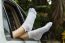 Woman Relaxing In Her Car