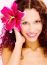 Woman With Flower In Her Curl Hair