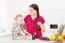 Mother And Son With Fruits In The Kitchen