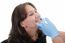 Female Patient Looking Treating At Her Dentist