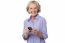 Aged Woman Texting On Her Mobile Phone