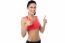 Smiling Fit Woman Gesturing Double Thumbs Up