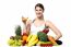 Young Woman With Fruits And Glass Of Juice