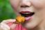 Woman Is Eating Fried Chicken