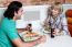 Couple Enjoying Dinner At A Restaurant