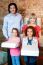 Excited Little Girls Holding Pizza Boxes