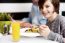 Boy Enjoying Food And Fresh Juice