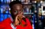 African Guy Drinking Beer, Blur Background