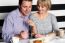 Couple Rejoicing Their Meal In Food Court