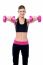 Trainer Holding Dumbbells In Her Outstretched Arms