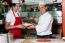 Male Chefs In Kitchen At Work