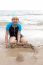 Girl Playing On Sea Beach