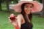 Young Woman Eating An Apple