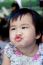 Close Up Face Of Lovely And Cute Asian Baby Making Funny Mouth