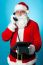 Modern Santa Passing Greetings Over A Phone Call