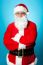 Confident Aged Male In Santa Costume