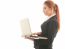 Business Woman Standing Using Laptop