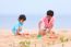 Young Brothers Play On Beach