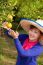 Gardener Girl In Orange Garden