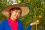 Gardener Girl In Orange Garden, North Of  Thailand