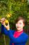 Gardener Girl Picking Fresh Orange