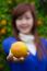 Gardener Girl Picking Fresh Orange