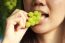 Woman Eating Green Grapes Friut