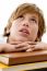 Close View Of Boy With Books And Looking Up