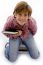 Top View Of Little Boy Holding Book