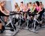 Group Of People Doing Exercise On A Bike