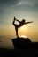 Silhouette Yoga Girl By The Beach At Sunrise