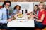 Family Eating Together In A Restaurant