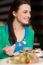 Happy Young Girl Enjoying Her Dinner