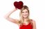 Cheerful Girl Holding Heart Shaped Gift