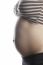 Woman Holding Her Pregnant Belly. White Background