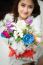 Asian Caucasian Giving Bouquet Of Colorful Flowers