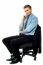 Pensive Businessman Sitting On The Chair