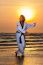 Taekwondo Man Training On Beach