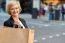 Cheerful Business Woman Holding Shopping Bag