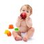 Cute Infant Boy With Apple