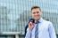 Businessman Standing Outside Modern Building