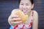 Woman Eating A Hamburger