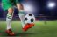 Soccer Football Players And Soccer Ball With Motion Blur Of Spor